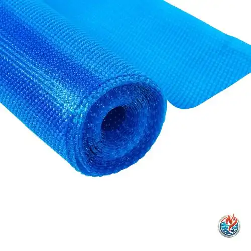 Partially unrolled blue solar pool cover with a bubble-texture surface on a white background. Real Relax Solar Pool Cover Review explains why the cover matters more than the heater